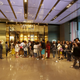 Customers line up as they wait to go inside a Gucci shop at a shopping mall in Shanghai, May 27, 2015.